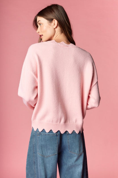 THE PINK SWEATER